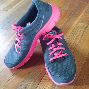 grey and pink Nikes